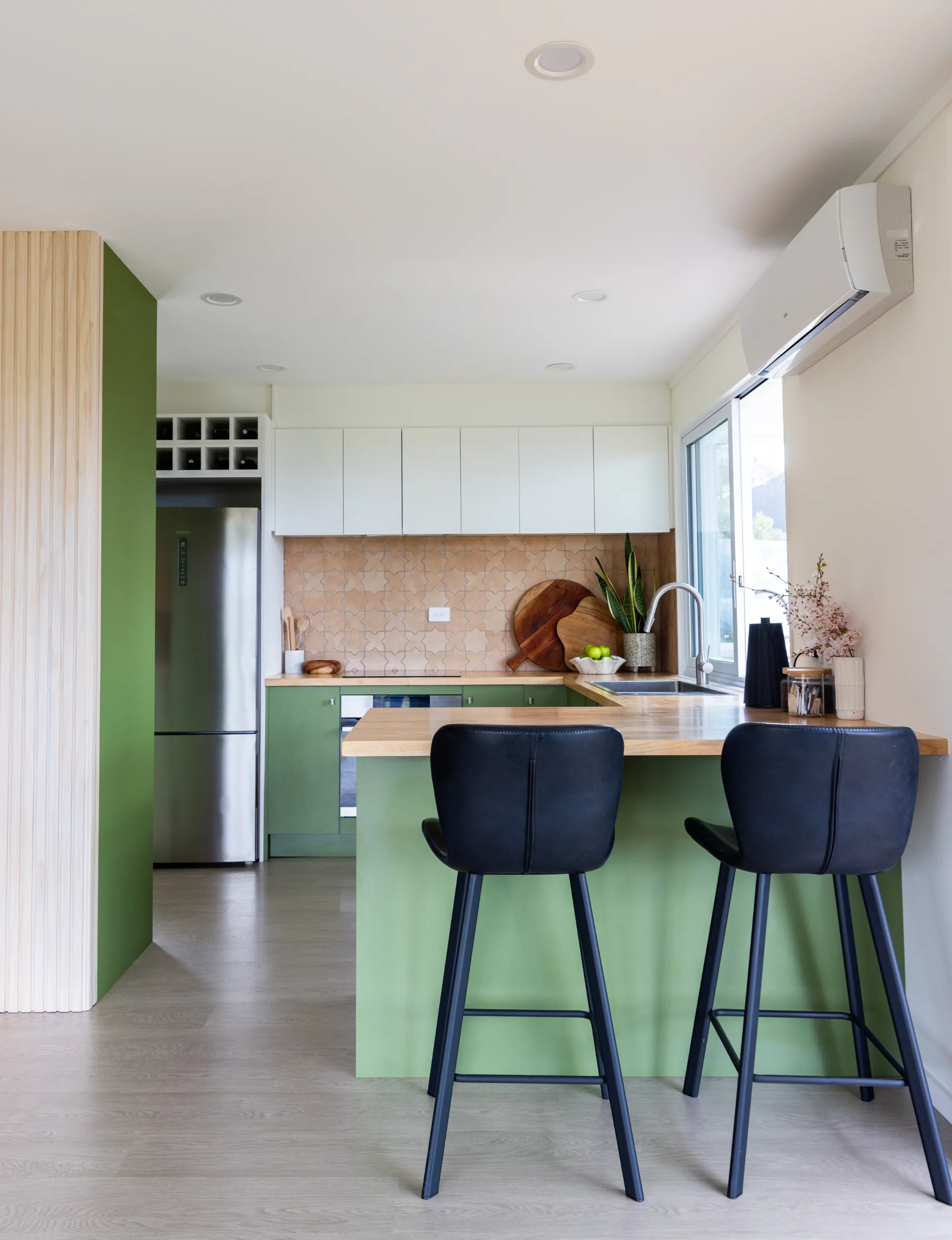 The green kitchen at Alice's parents home in Hatfields Beach