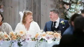 Katie and Tim chatting at their 2025 MAFS wedding