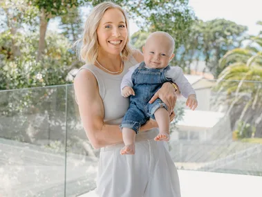 Betsy Hassett in NZ with her baby son