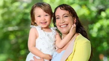 Bronwyn Turei holding her daughter Tiakiwai