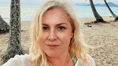 MAFS narrator Helen Dallimore taking a selfie on a beach