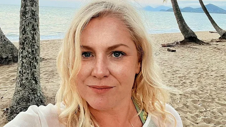 MAFS narrator Helen Dallimore taking a selfie on a beach