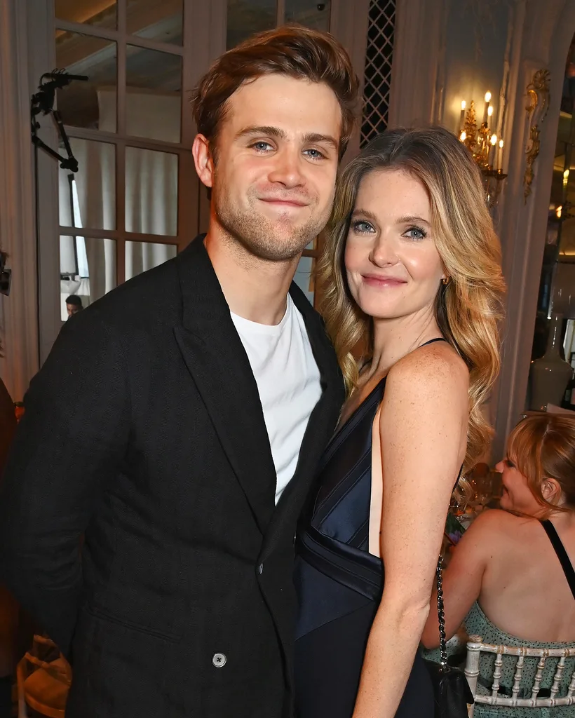 Leo Woodall standing next to Meghann Fahy