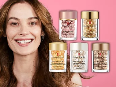 Women smiling with pink background with Elizabeth Arden Ceramide bottles