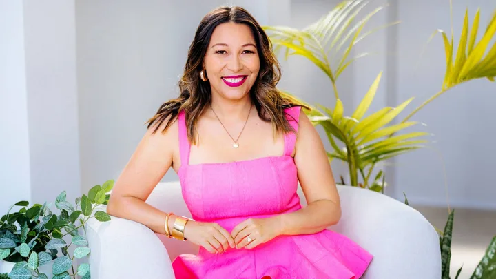 Melissa Chan-Green sitting on an armchair