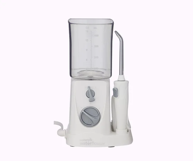 Waterpik nano on pink background