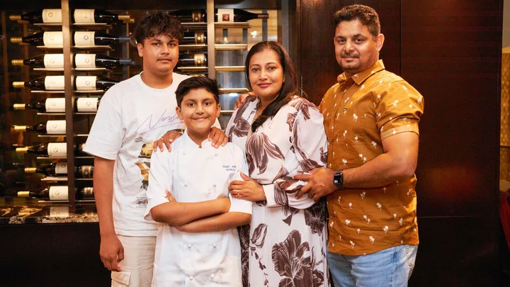 Aron Birbal with his family at Cassia restaurant