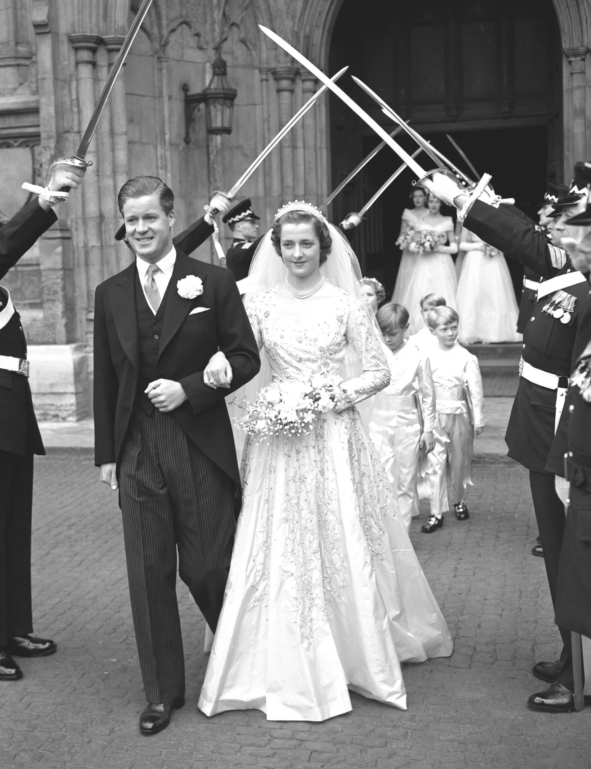 Johnny Spencer and Frances walking out of their wedding