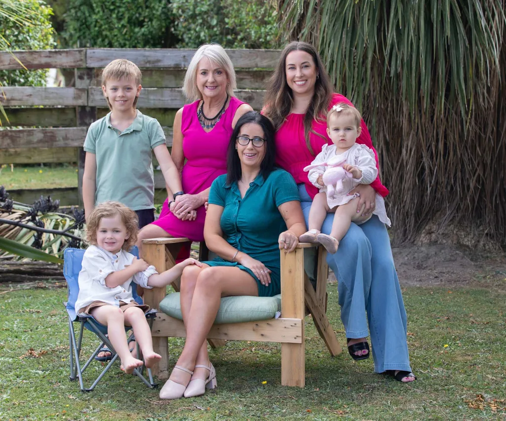 Grace Archer with her family sitting outside