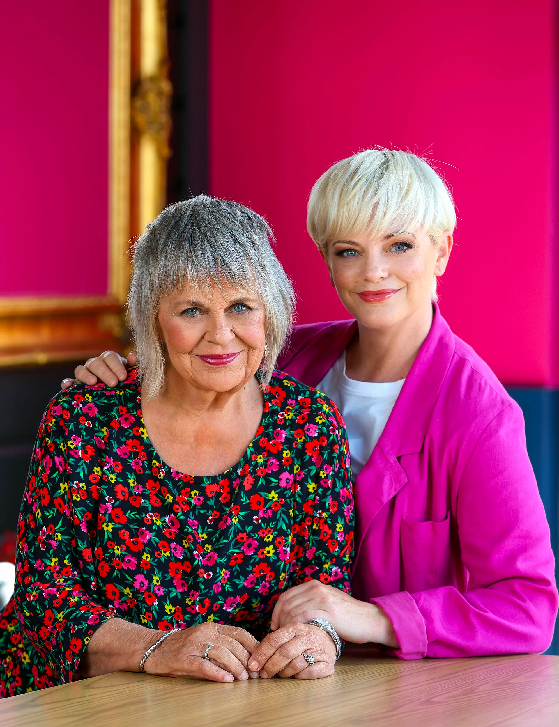 ginette mcdonald laura hill wearing bright coloured clothing