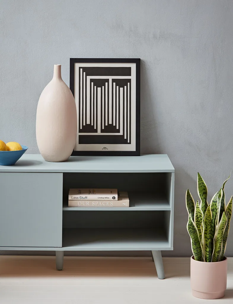 Resene Duck Egg Blue on the walls of this chic living space offers a cool, modern aesthetic