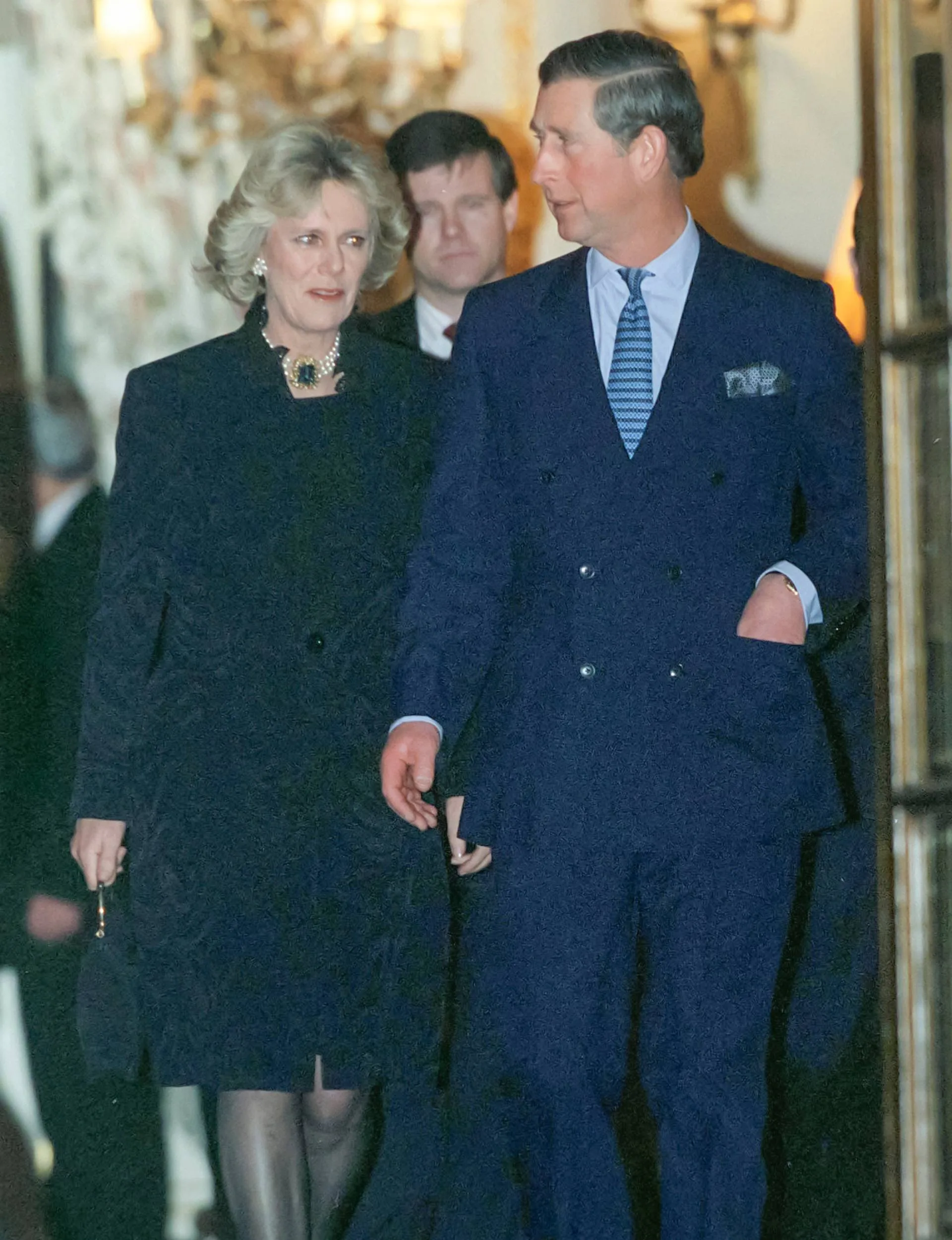 Charles and Camilla entering a party in 2000