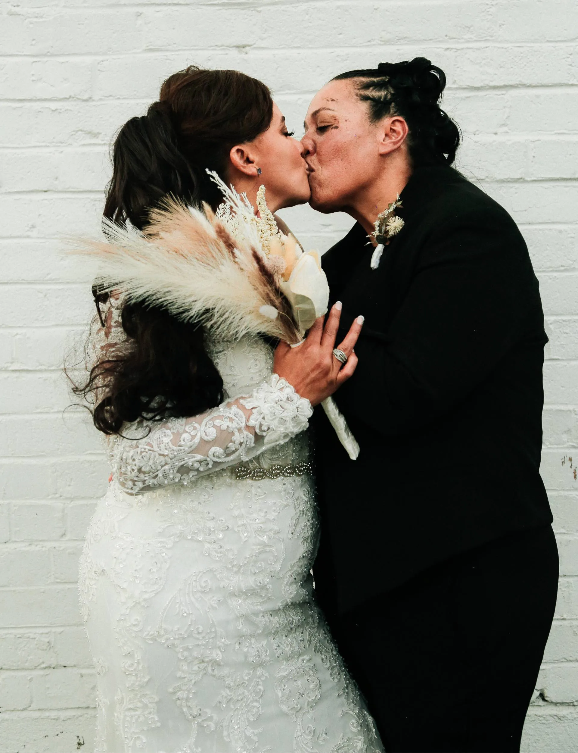 The newlyweds share a kiss