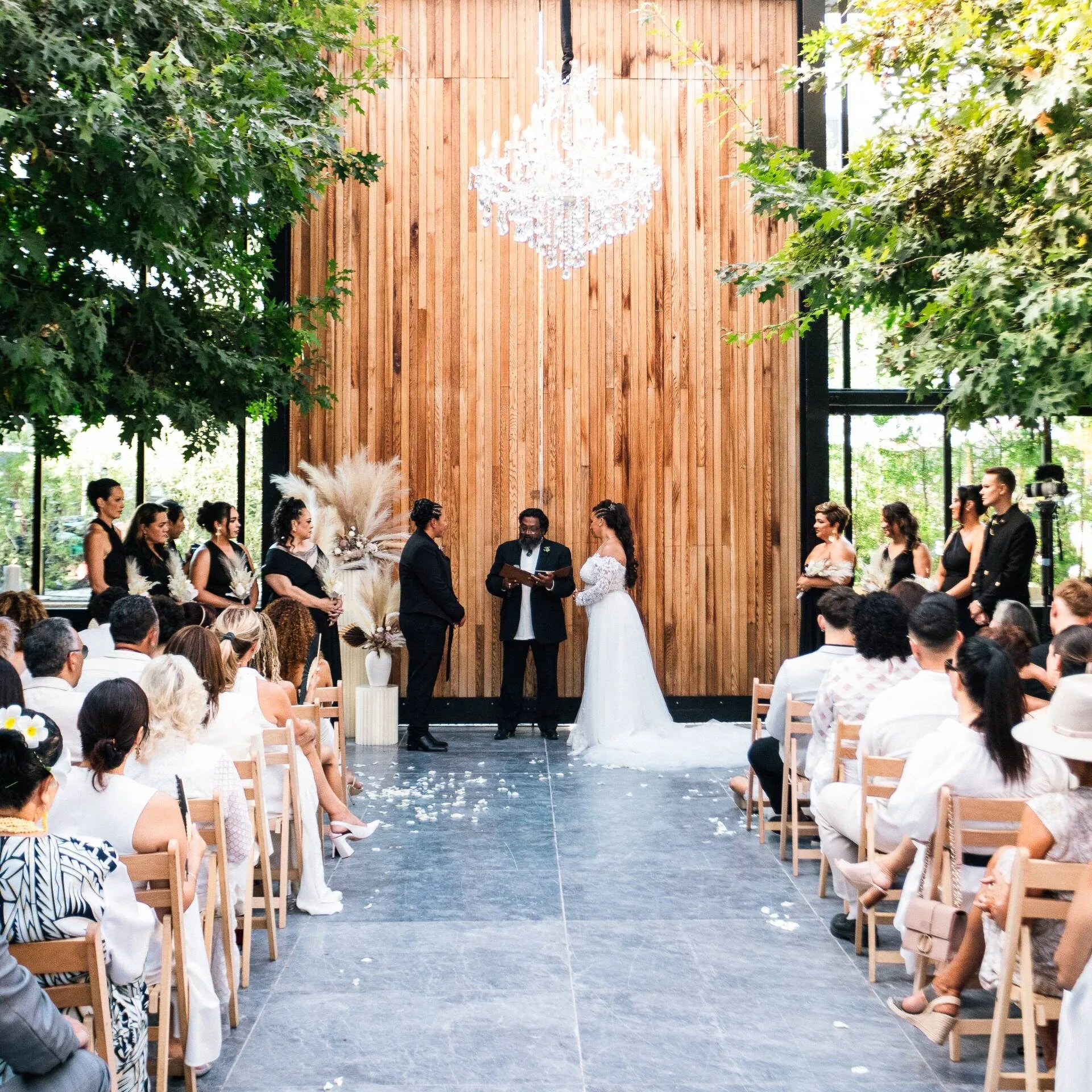 Natalie and Megan at the front of the altar on their wedding day