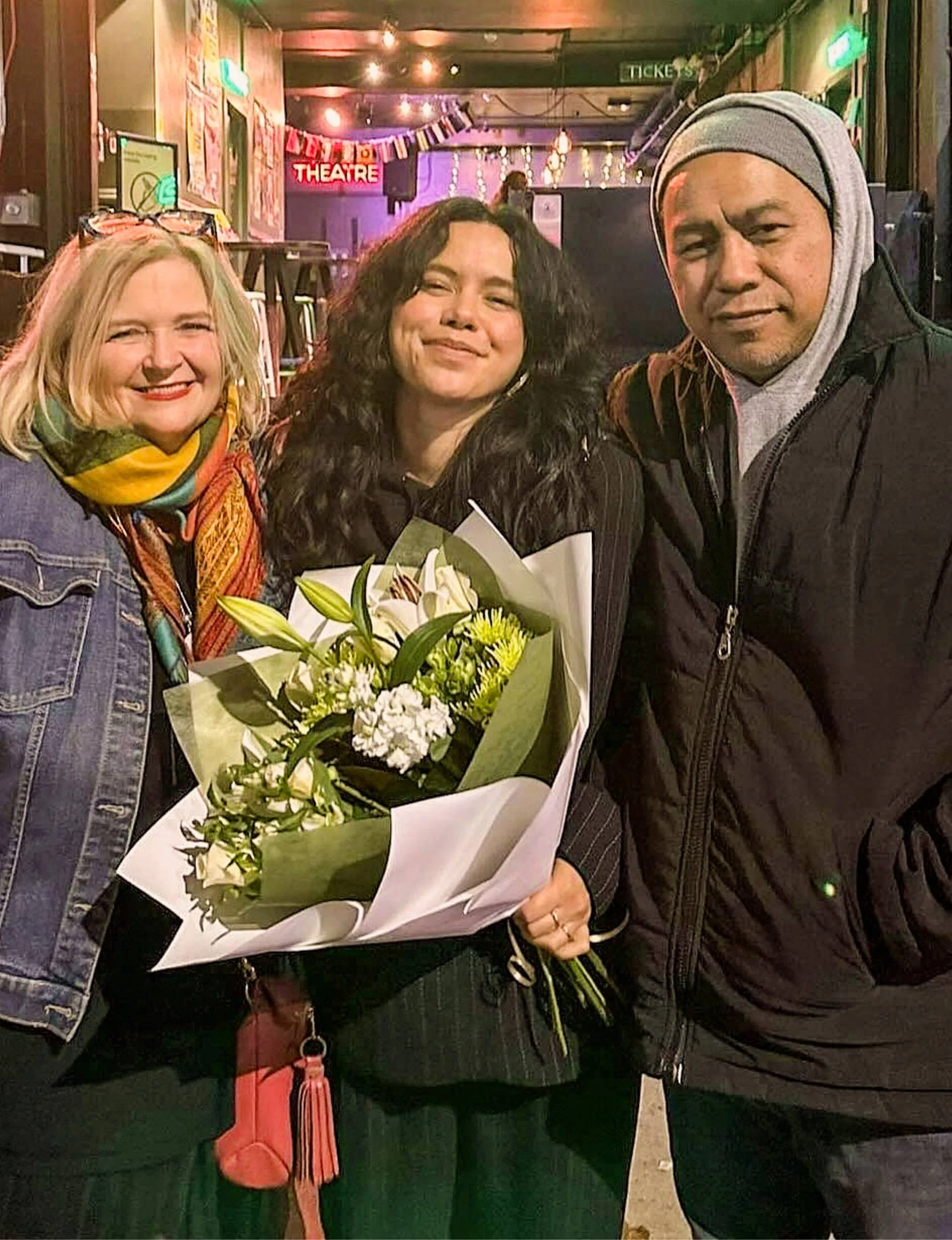 Courtney and her parents after a gig