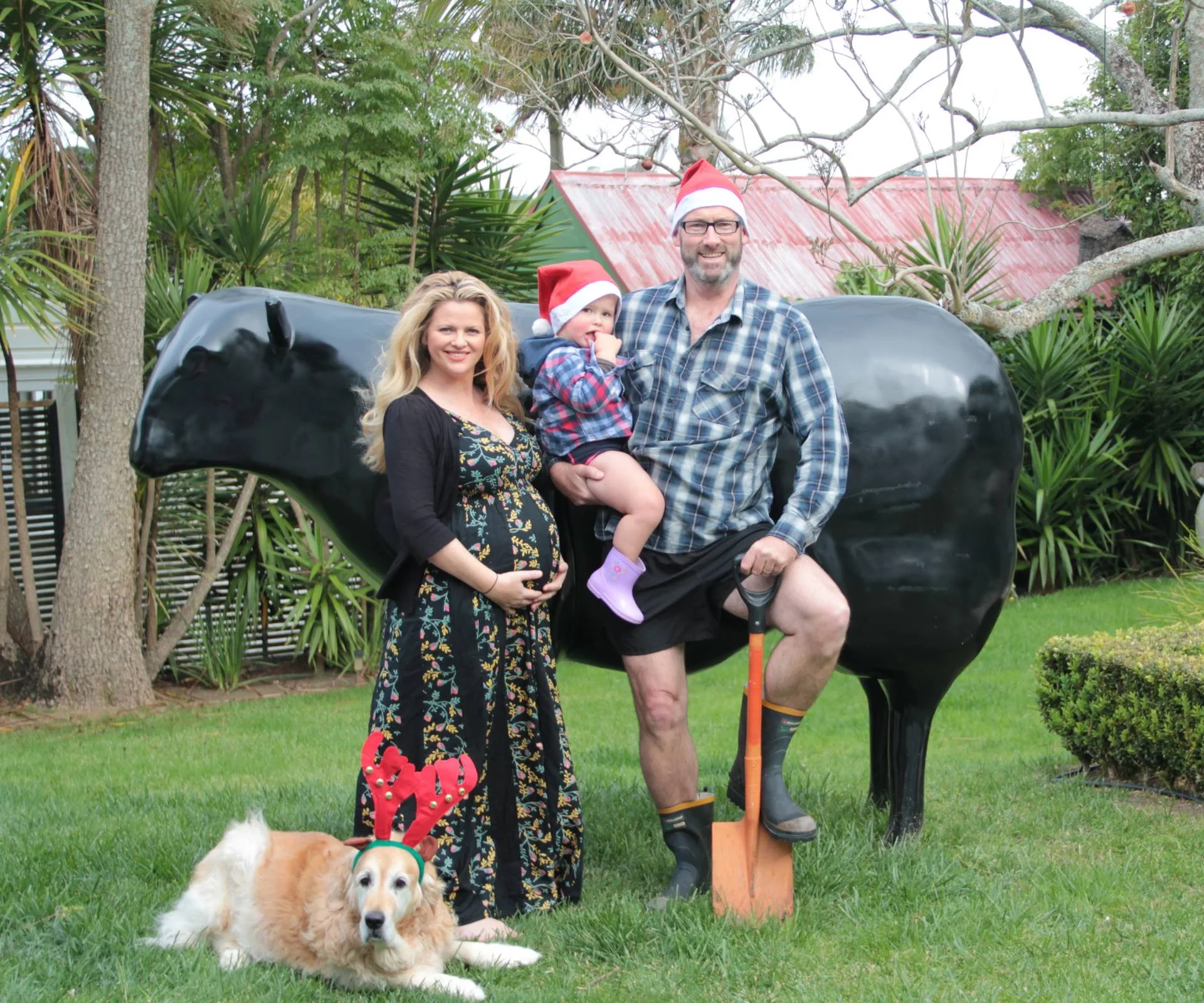 Jeremy and Megan Corbett with the oversized sheep while it was painted back