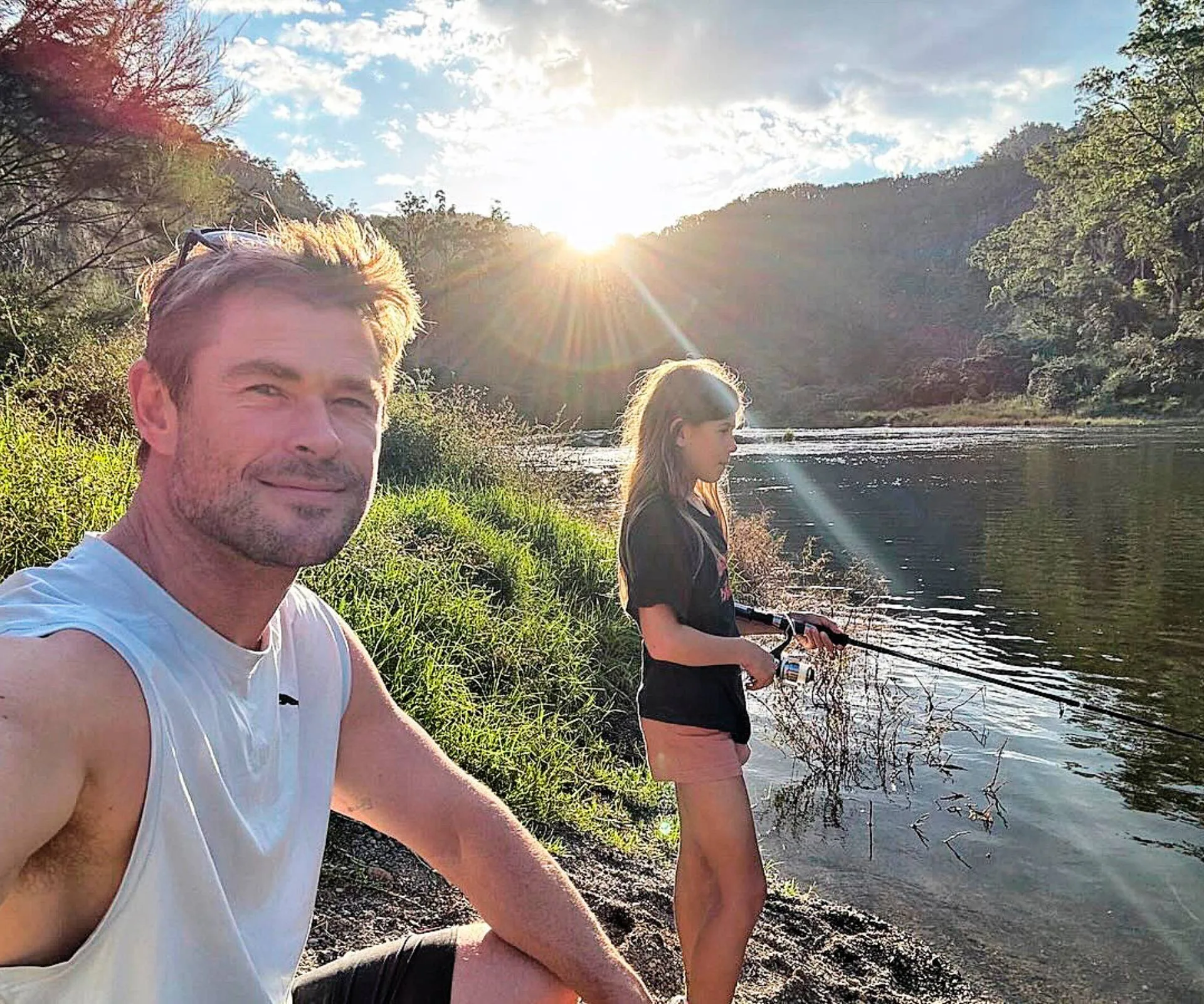Fishing on the riverside with daughter India