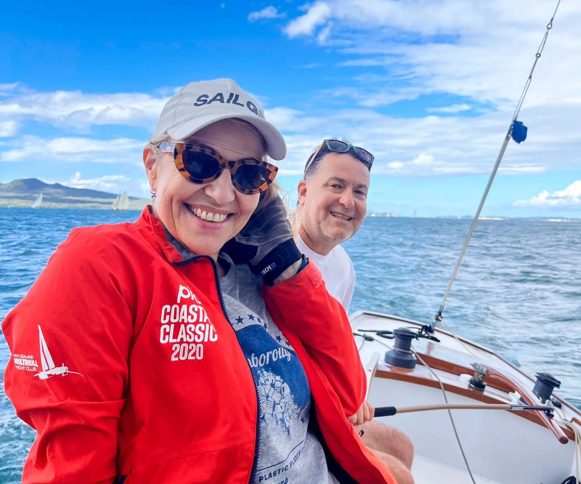 Mel Homer with her husband on a boat