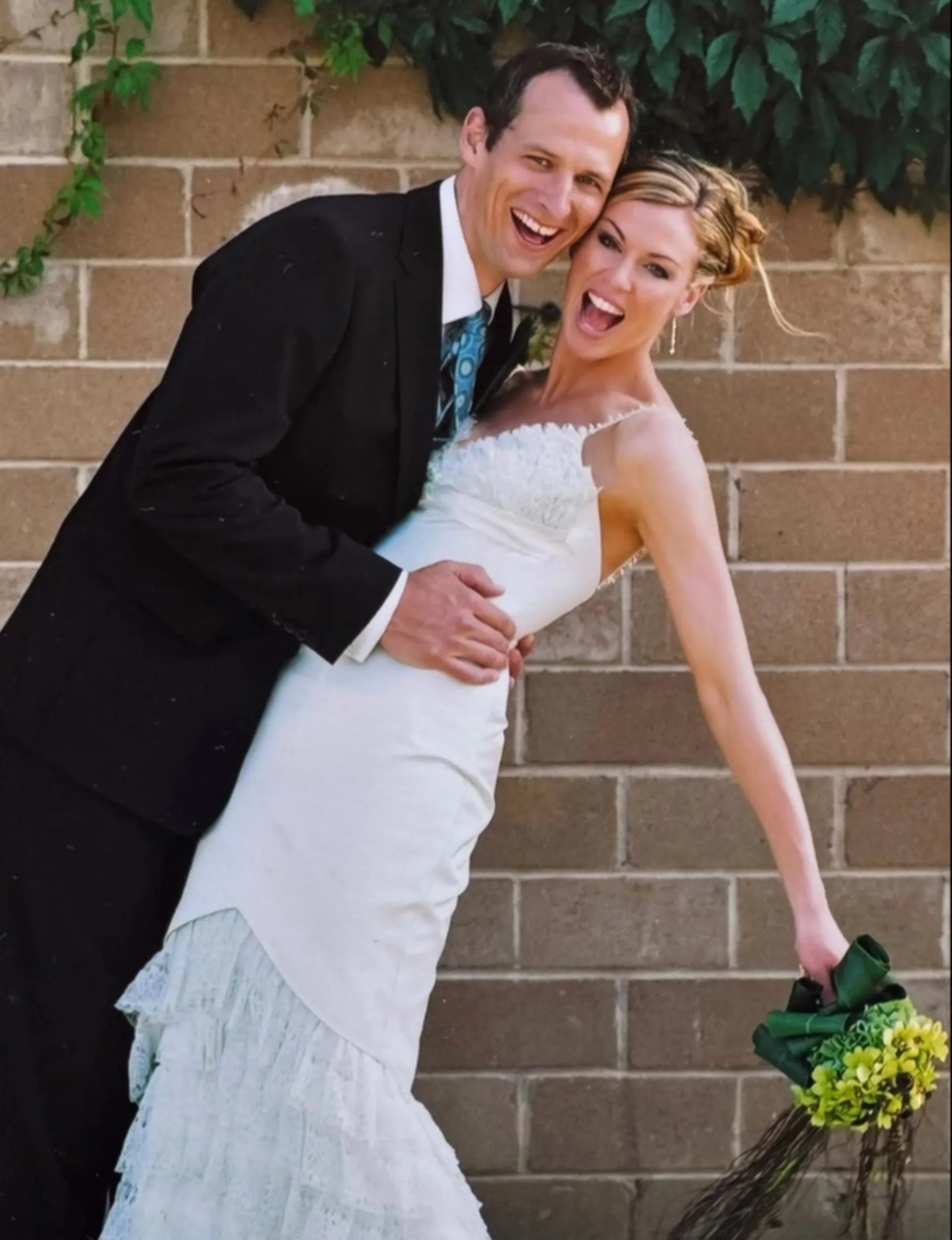 Wendy Petrie and her husband Ross on their wedding day 20 years ago
