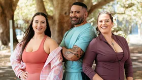 Flava stars Charlie, Azura and K'Lee standing back to back in a park wearing fitness gear