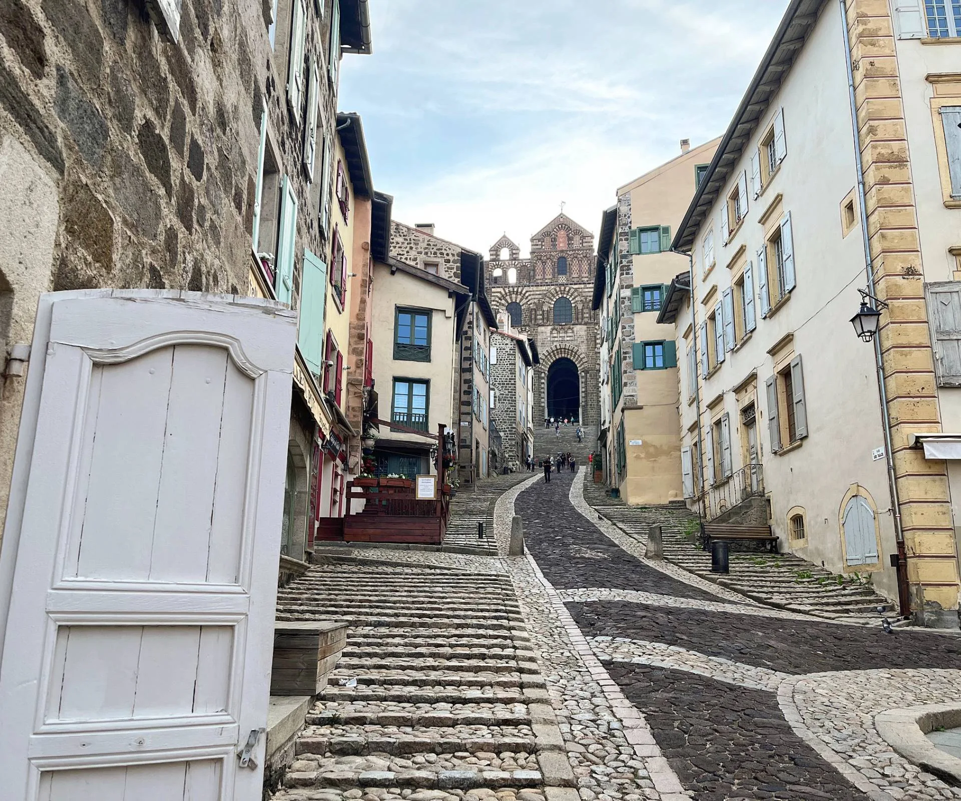 A French road lined with aged buildings