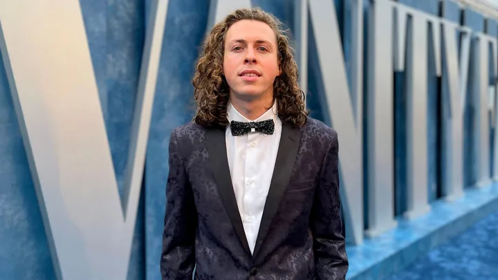 Liam McEwan at a Vanity Fair carpet event