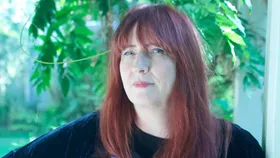 Rachael King in front of a window