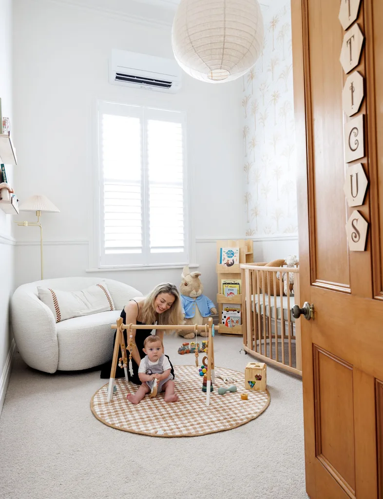Baby Atticus' nursery is painted in Resene White Pointer and inspired by the beach and nature