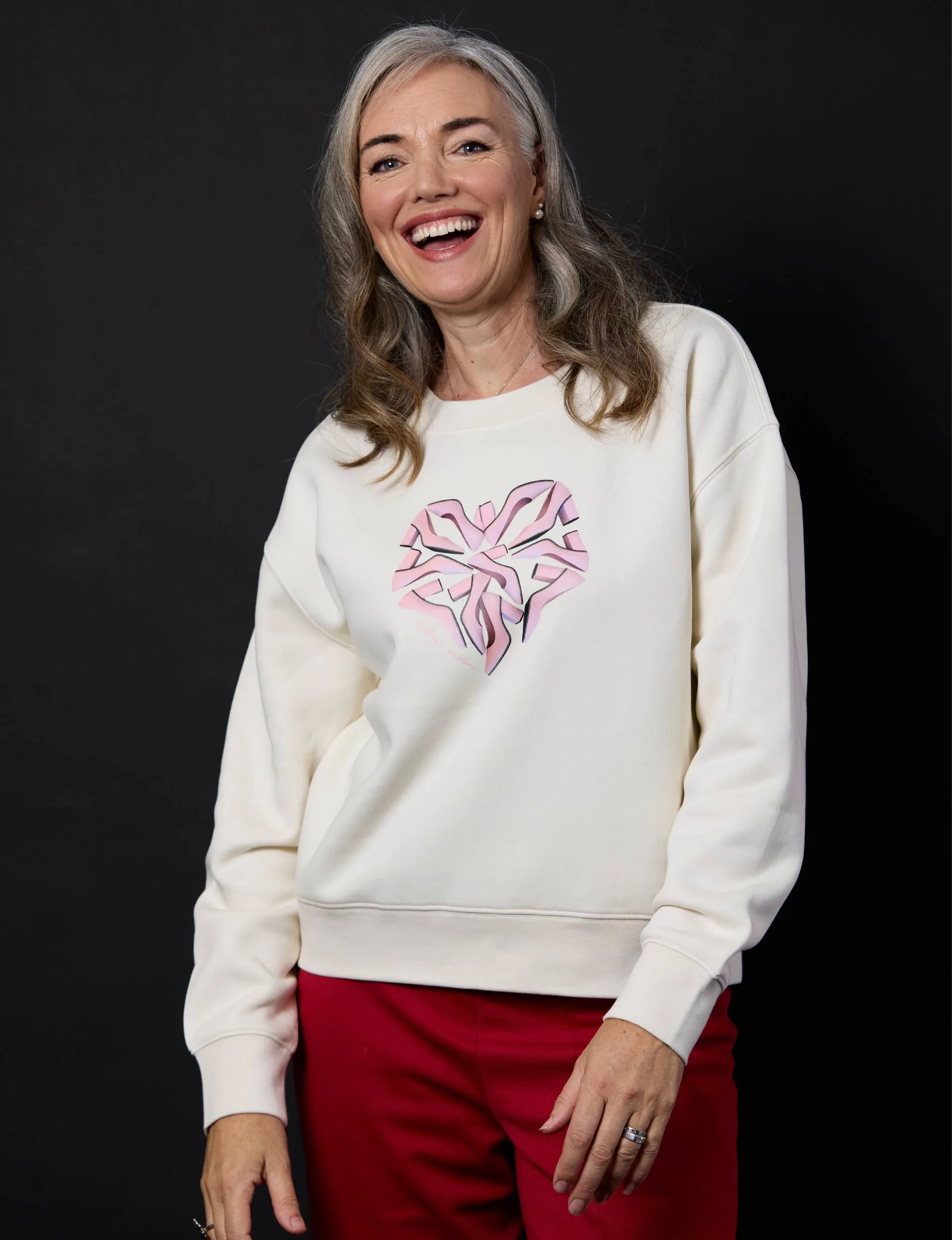 Petra Bagust wearing a sweatshirt by Kathryn Wilson for Tees for a Cure.