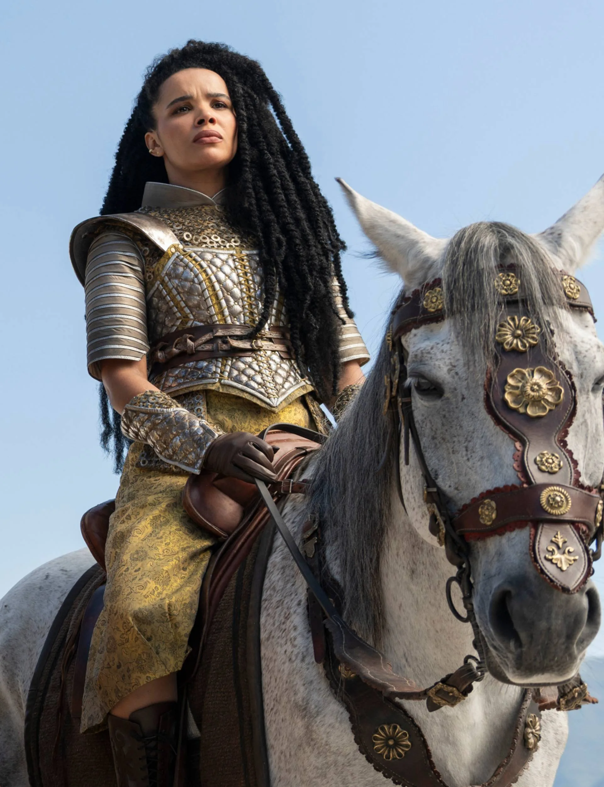 Zoë Robins riding a horse in The Wheel Of Time