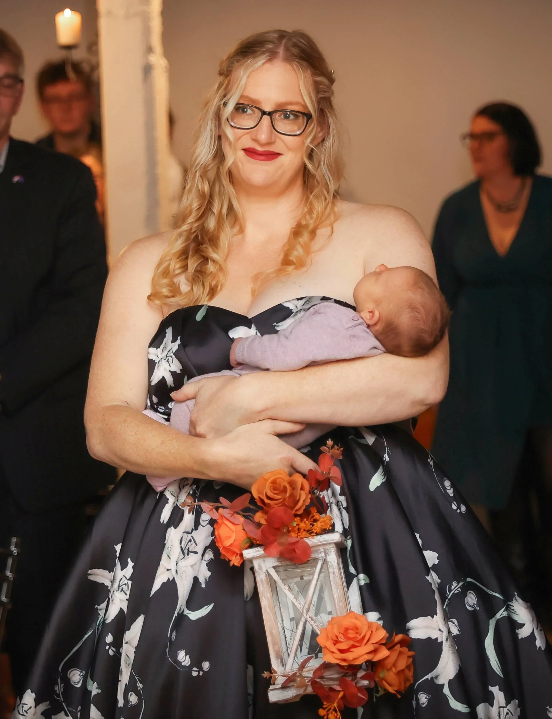 Fhiona Hartshorn walking into her wedding with baby Cassandra