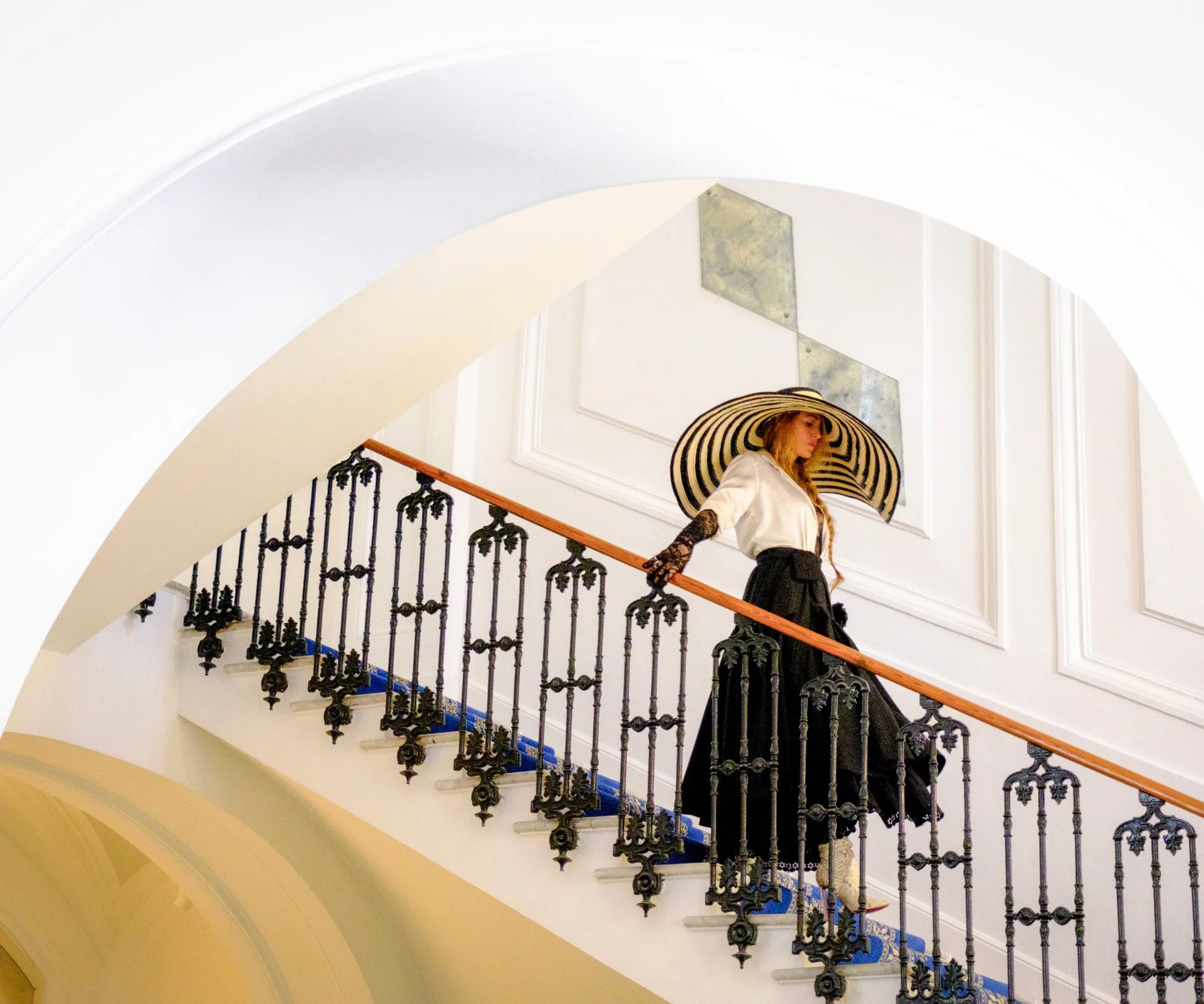 Blake Lively descending the stairs in Another Simple Favor