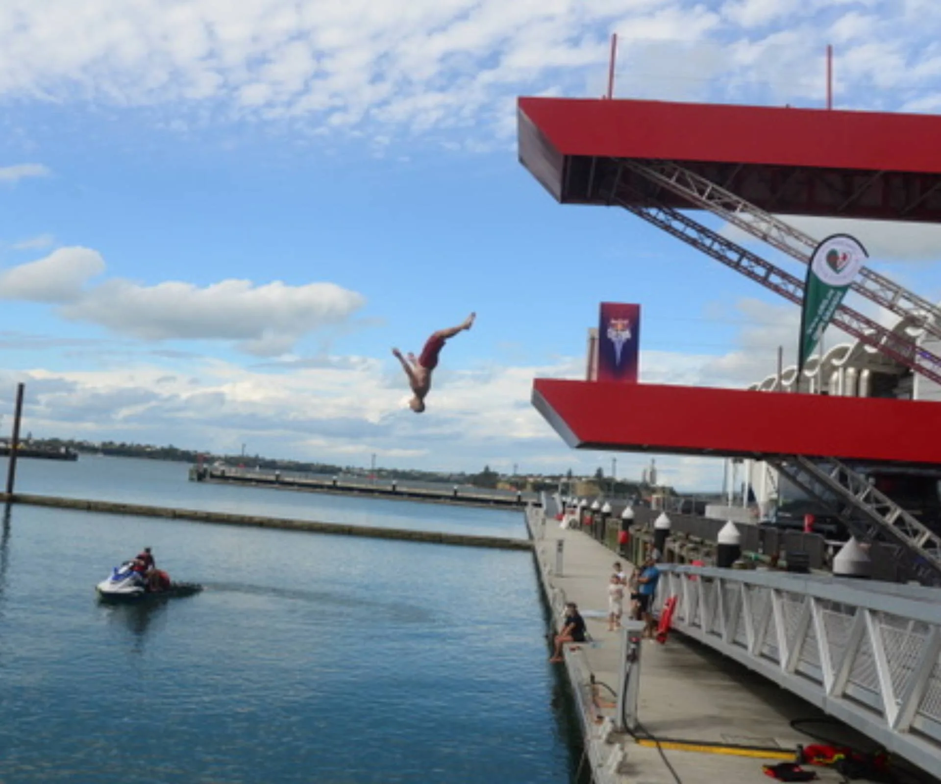 Bruce Hopkins doing a backflip of a high platform