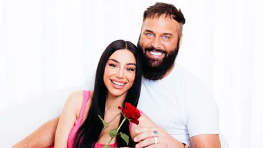 Naz Khanjani laying across her husband Jonny's lap