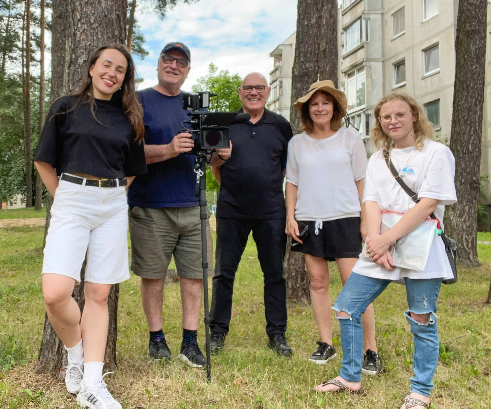 David Lomas and Clarinda Franklin with Justina, an interpreter and a cameraman in Lithuania