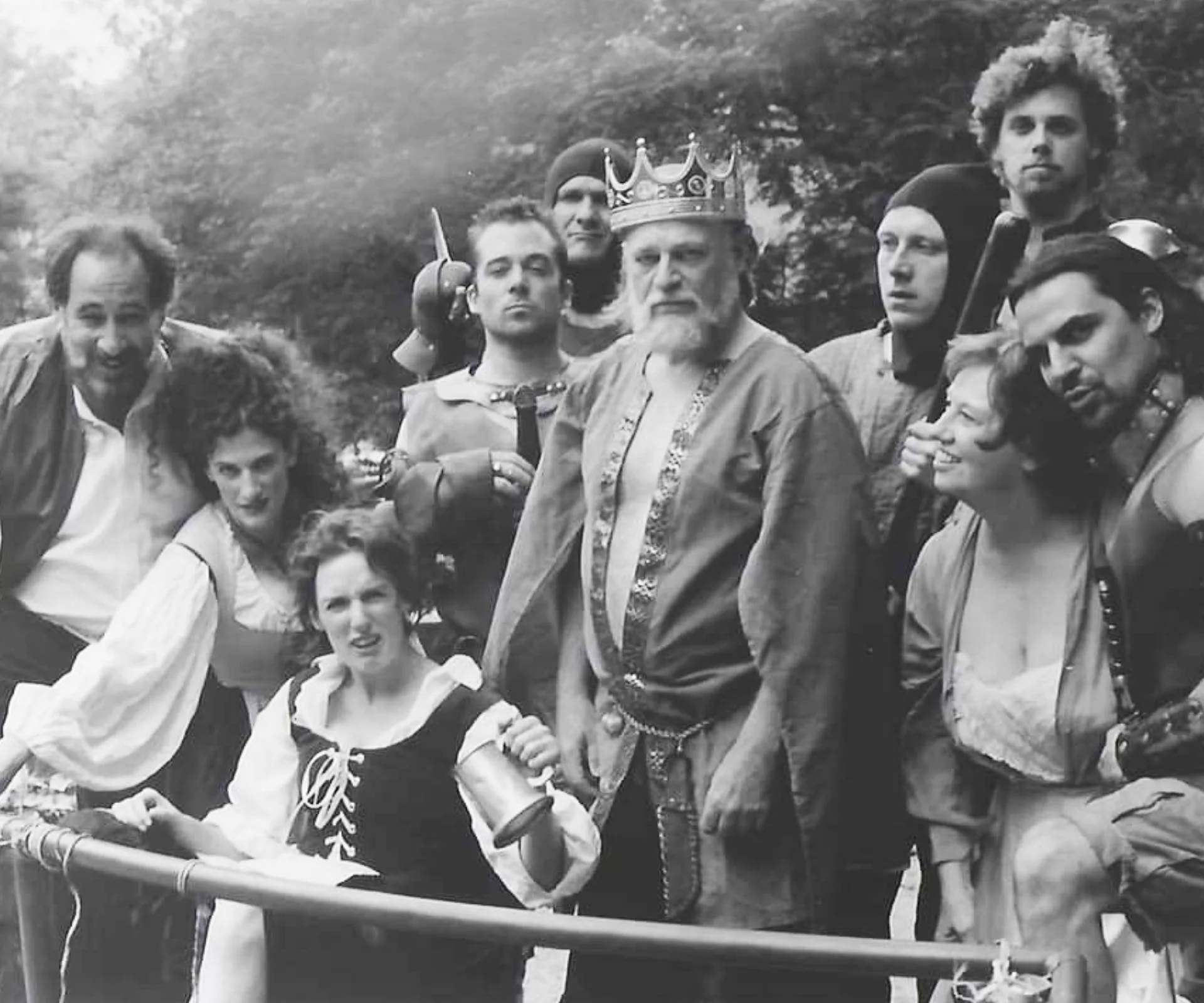 A black and white photo of Lara Macgregor and her old castmates