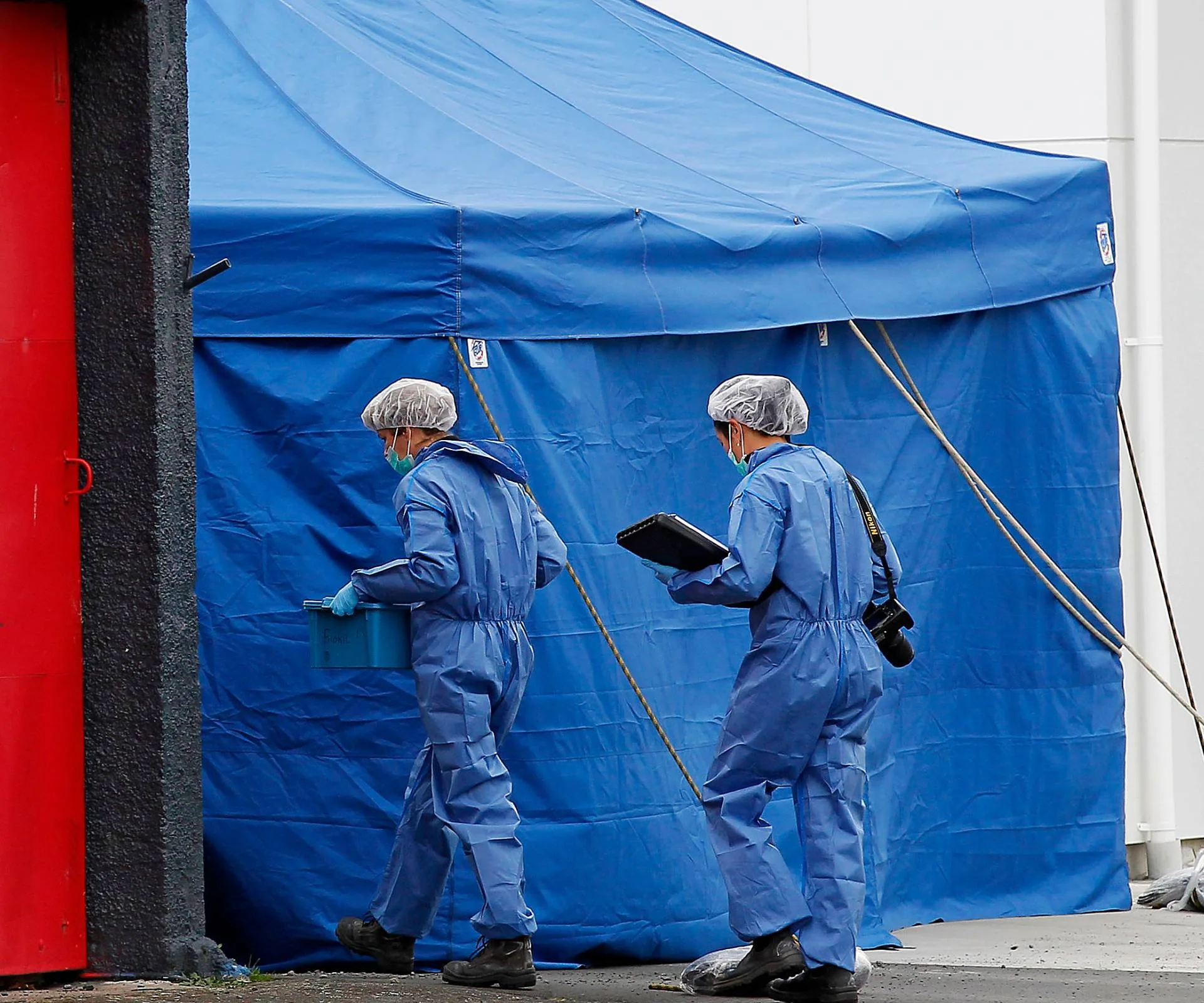 crime scene investigators at the scene
