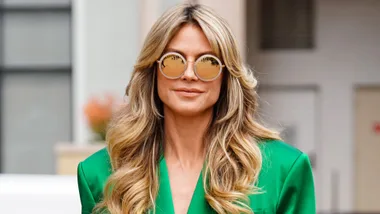 Heidi Klum with a flawless face of makeup after using her fast beauty fixes