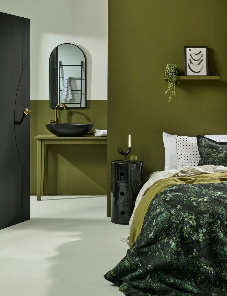 Sumptuous, rich greens meet charcoal in this bedroom and ensuite for the perfect autumnal bedroom makeover