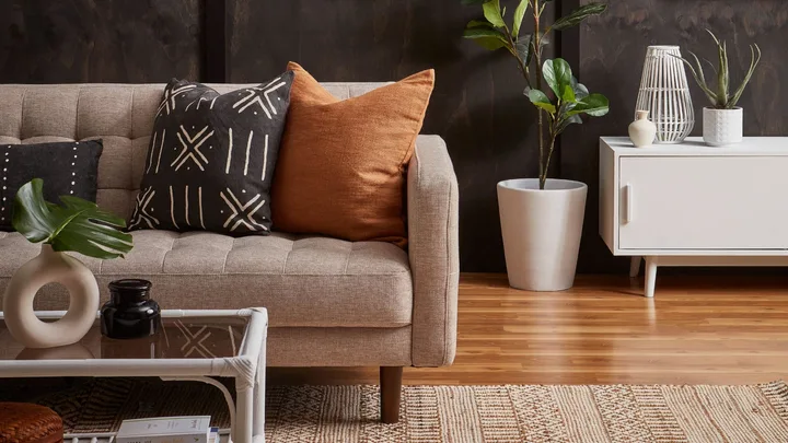 Autumn colours like orange, beige and white through this living room