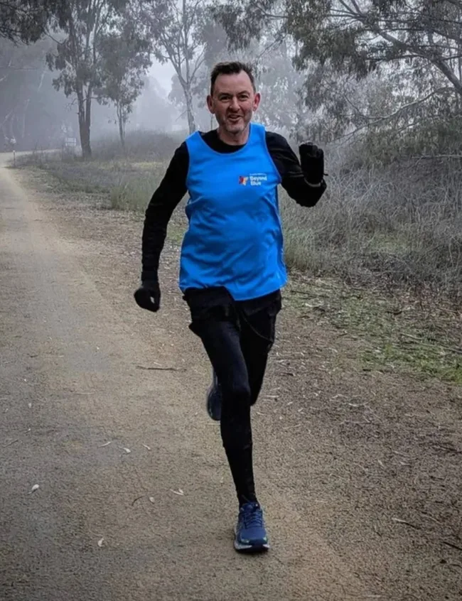 Matt Hopcraft running in the rain