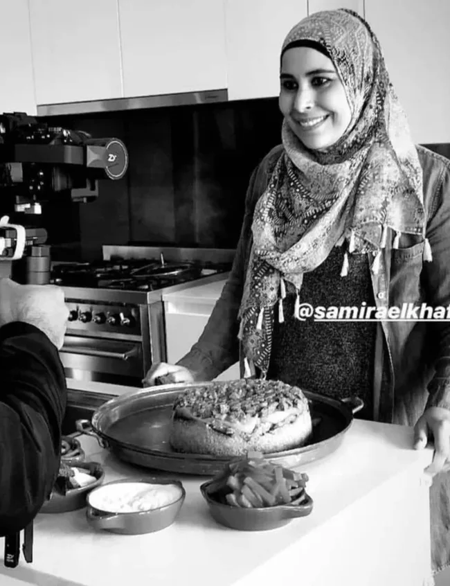 Samira El Khafir filming in her kitchen