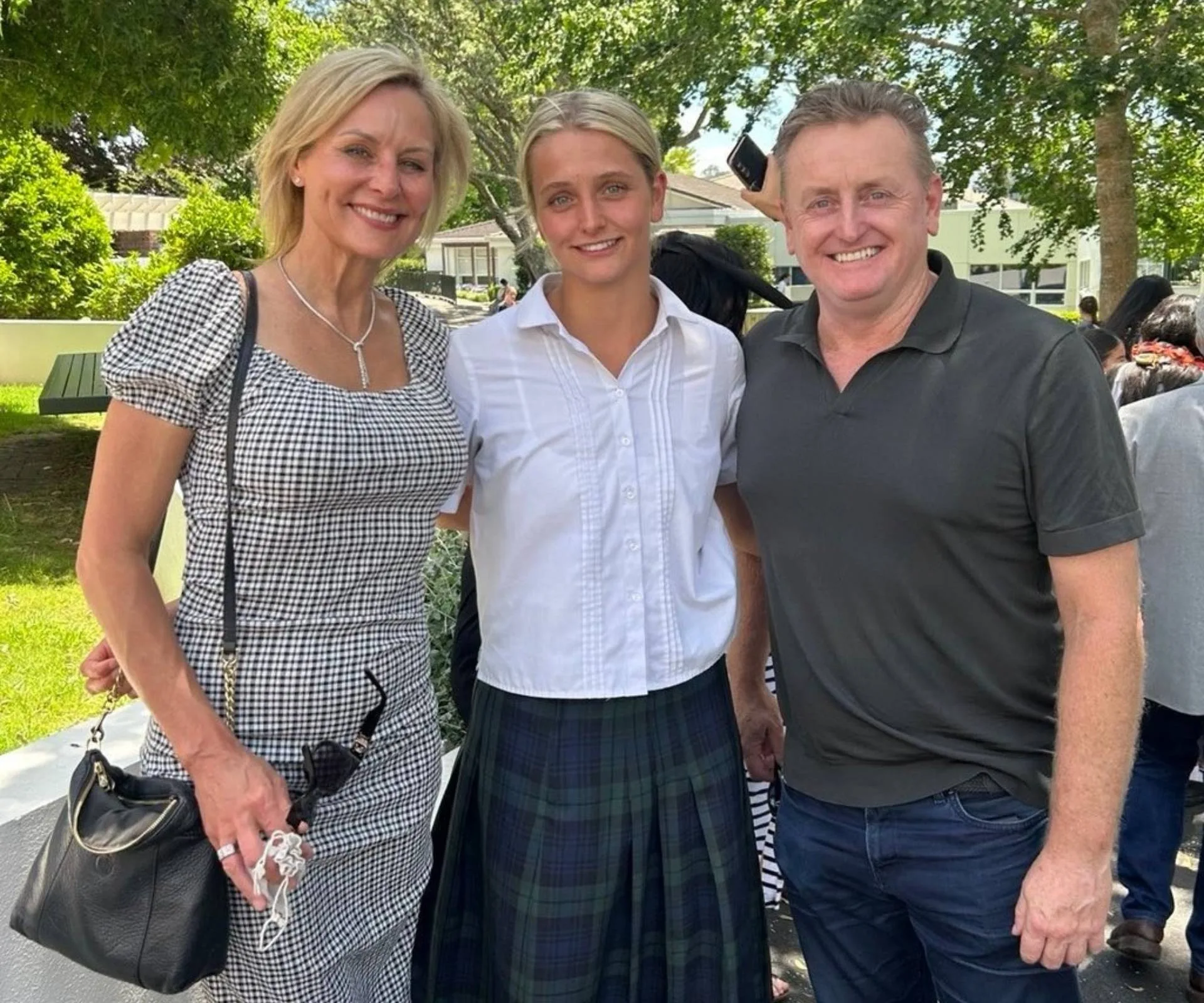 Nicky with her daughter and husband