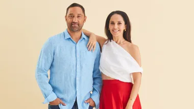 Benji and Zoe Marshall in front of a beige backdrop