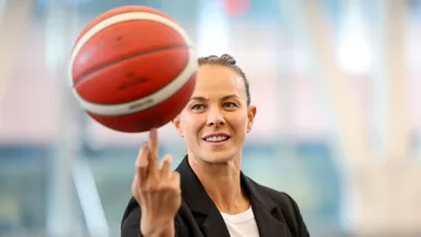 Dame Lisa Carrington spinning a basketball on her finger