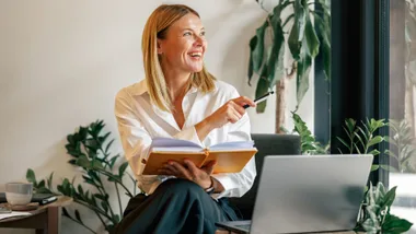 A woman journaling about resilience