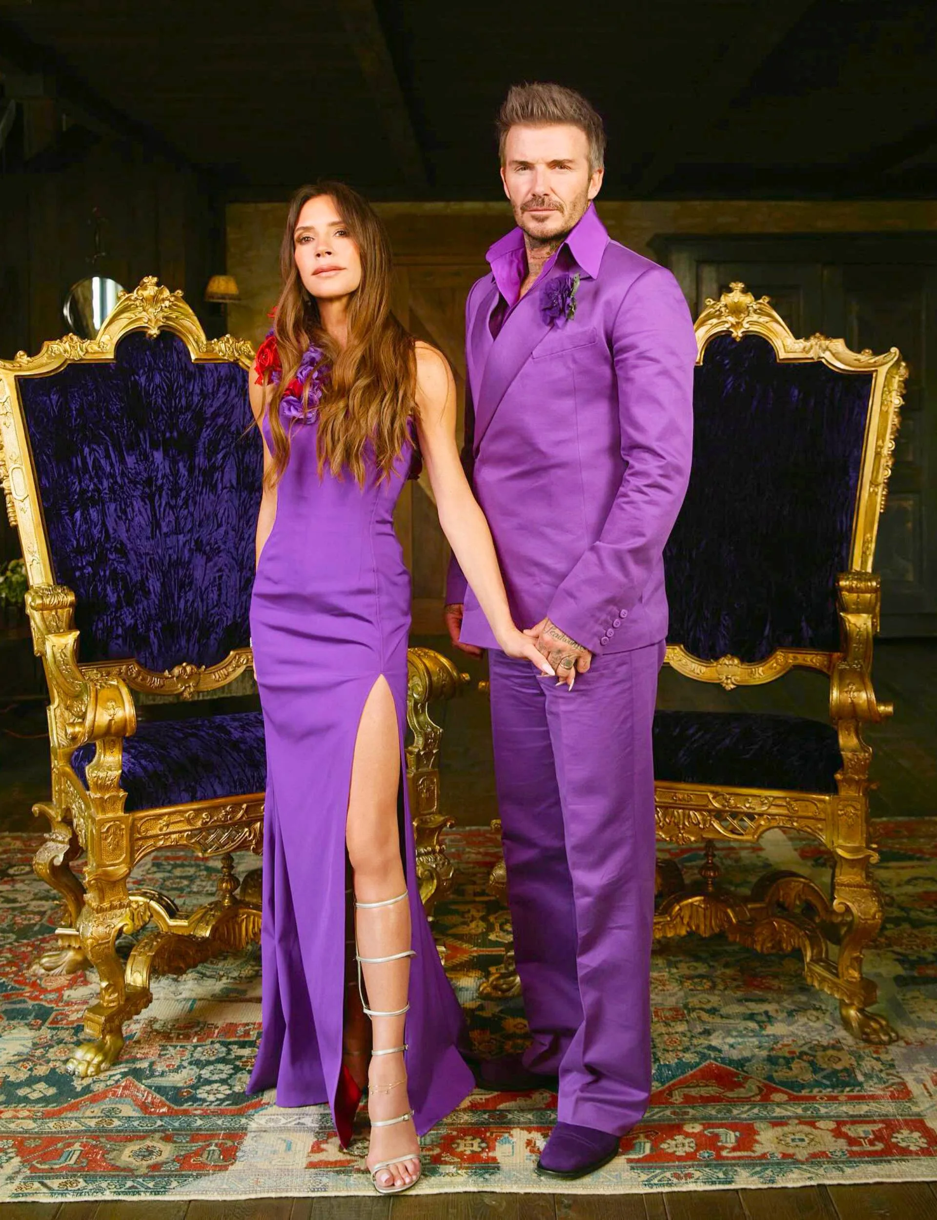 David and Victoria in their purple wedding outfits