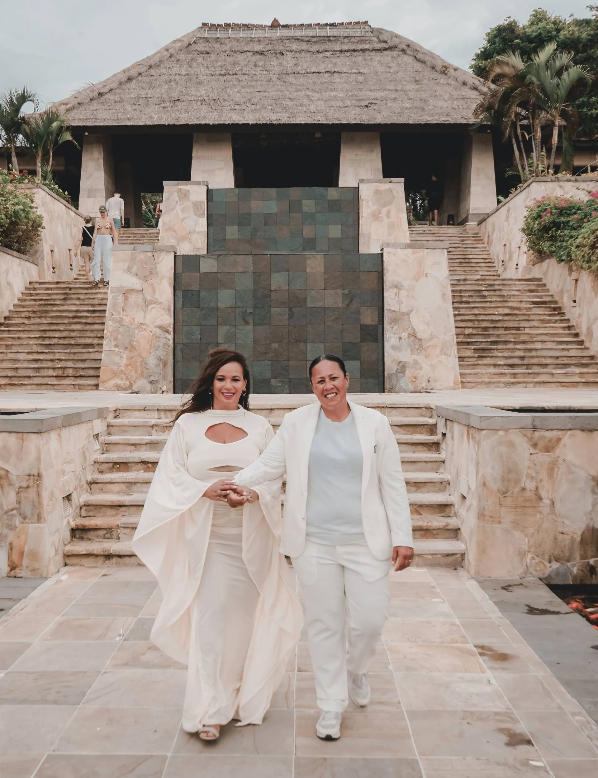 Megan and Nat in front of a temple on their honeymoon