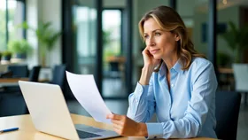 A woman looking at a piece of paper