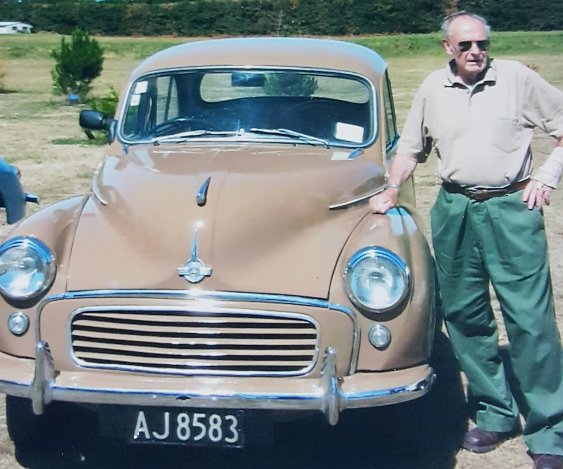 Marilynn's dad with his brown Morris Minor